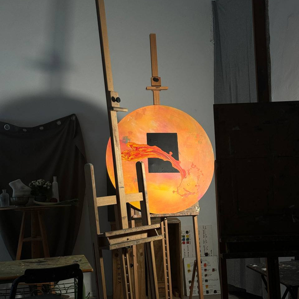 Circular abstract painting with black square and red-orange motion by Lily Glow Home Decor