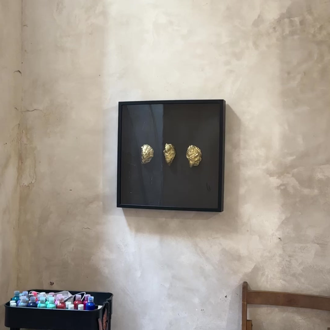 Three gold oyster shells framed on black background – Lily Glow Home Decor